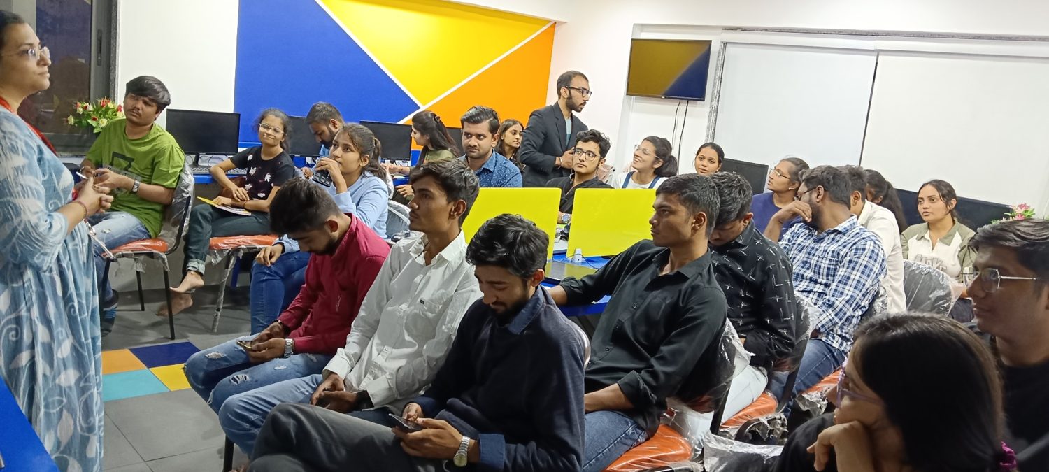 Learners seated in a classroom session